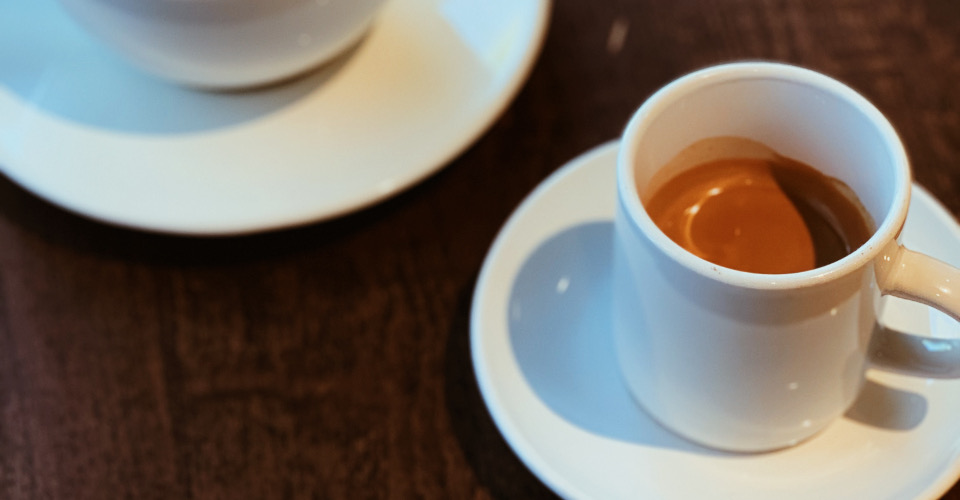 Woman drinking a latte