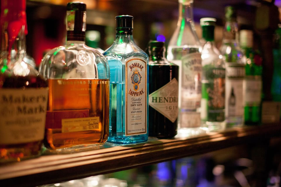 Top shelf liquors and spirits lined up for display